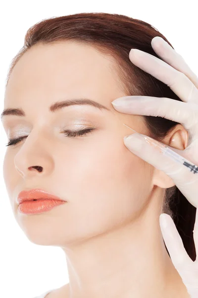 Woman's face is being prepareg to plastic surgery. — Stock Photo, Image