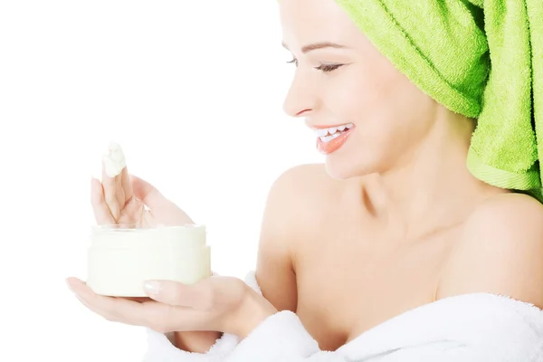 Woman with towel and in bathrobe. — Stock Photo, Image