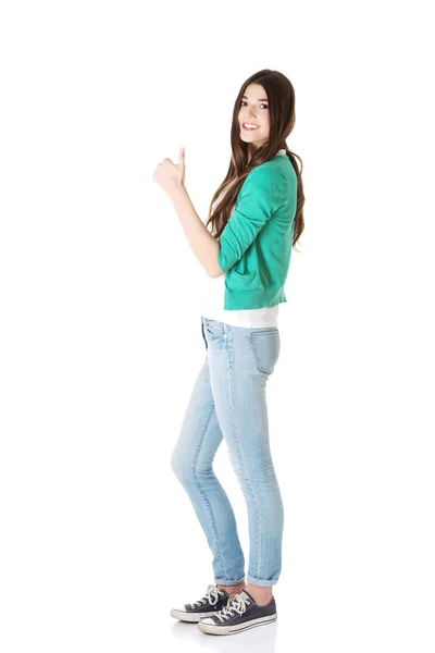 Beautiful young student showing OK. — Stock Photo, Image