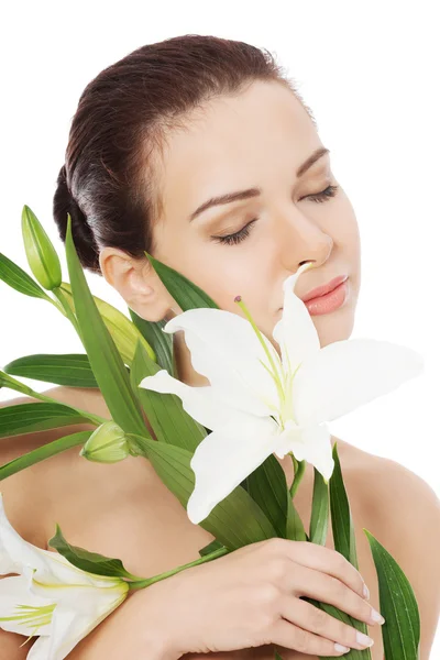 Beautiful topless woman with white lily. — Stock Photo, Image