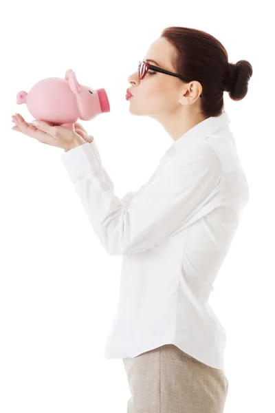 Vrouw piggy-houderbank. — Stockfoto