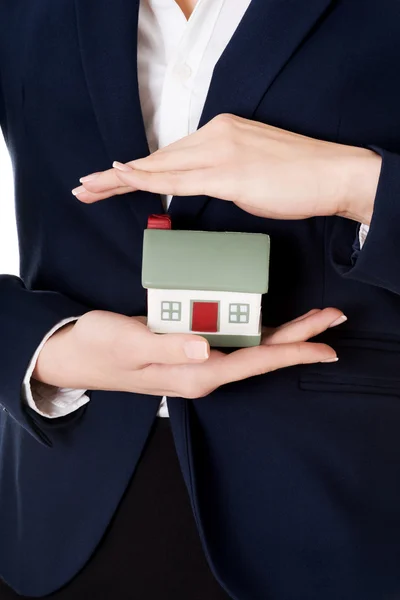 House model in woman's business hands. — Stock Photo, Image