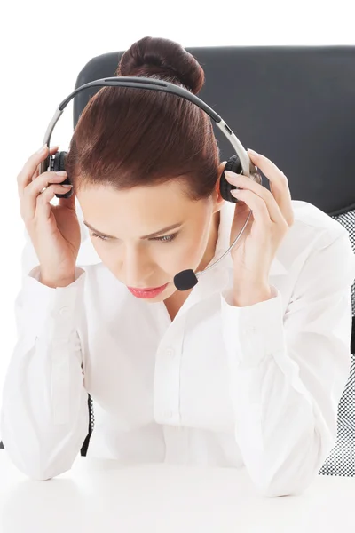 Cansada, mulher de negócios triste no call center . — Fotografia de Stock