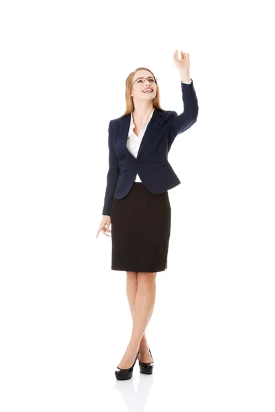 Business woman is touching an abstract space — Stock Photo, Image