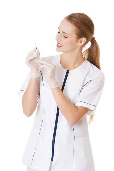 Enfermera o médico con aguja — Foto de Stock