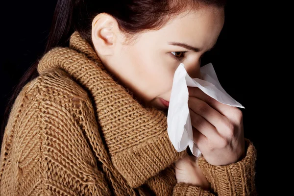 Young beautiful woman with tissue. — Stock Photo, Image