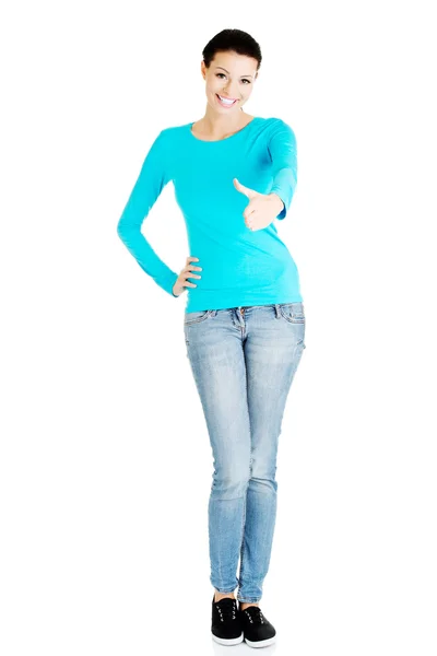 Young casual woman showing welcome gesture. — Stock Photo, Image