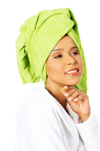 Woman wrapped in towel with turban — Stock Photo, Image