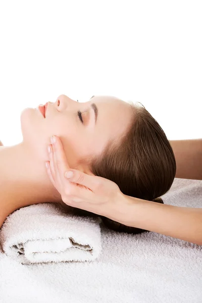 Relaxed woman enjoy receiving face massage — Stock Photo, Image