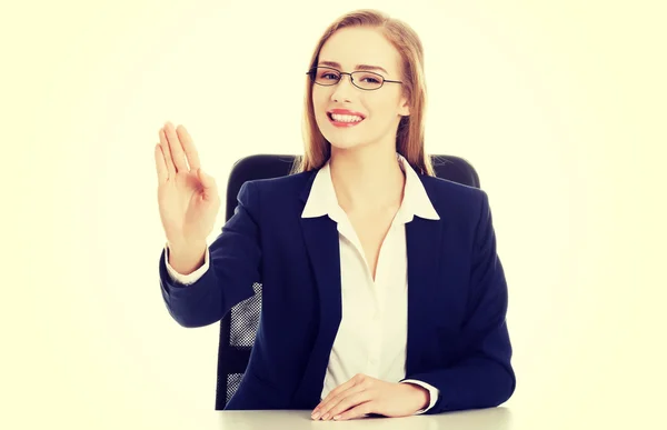 Woman is sitting and showing stop gesture. — Stock Photo, Image