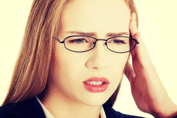 Mujer de negocios con dolor de cabeza . —  Fotos de Stock