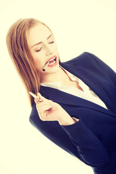 Business woman with pen — Stock Photo, Image