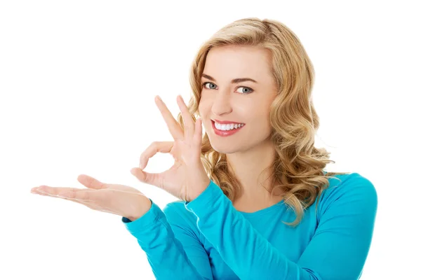 Woman showing something or copyspase — Stock Photo, Image