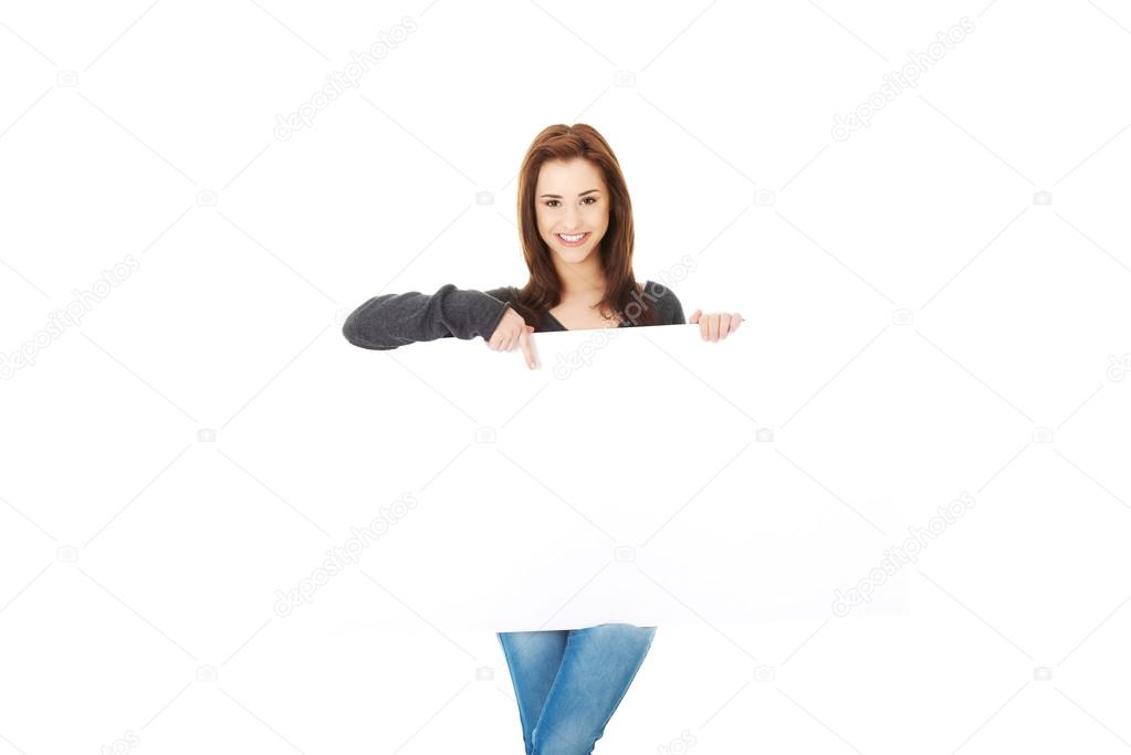 Woman with blank board