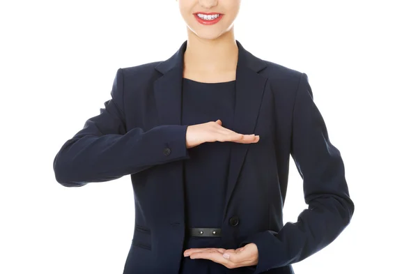 Geschäftsfrau zeigt etwas oder Kopie — Stockfoto