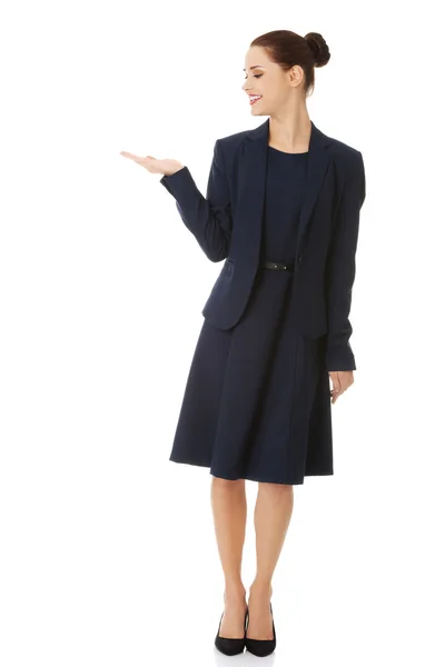 Business woman showing something or copyspase — Stock Photo, Image