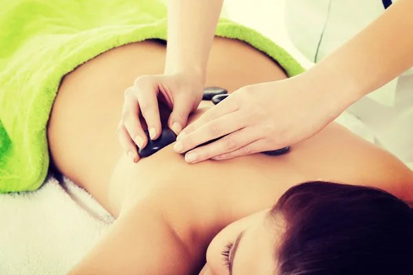 Woman having stone massage — Stock Photo, Image