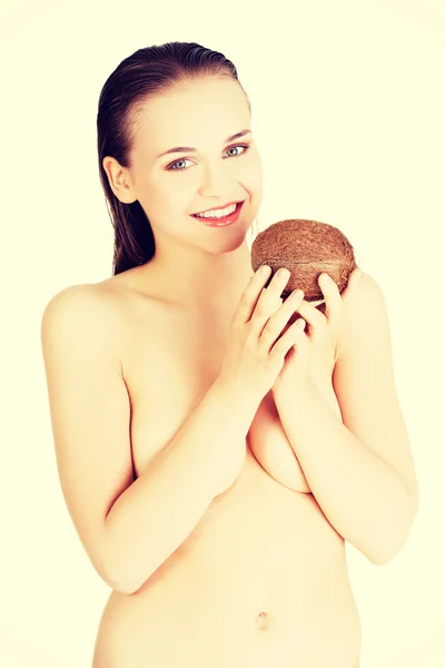 Hermosa mujer con coco — Foto de Stock