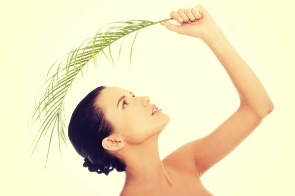 Young beautiful woman with green leaf — Stock Photo, Image