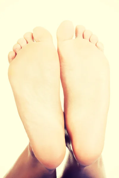 Beautiful female a foot and a heel lifted upwards — Stock Photo, Image