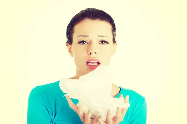 Young woman with tissue - sneezing — Stock Photo, Image