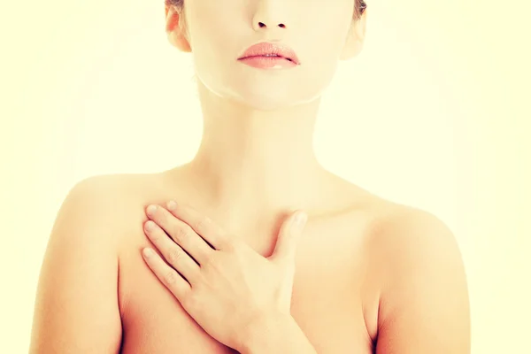 Beautiful sensual young woman touching her chest — Stock Photo, Image