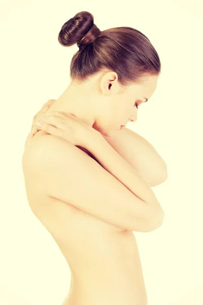 Mujer joven con dolor en la espalda. —  Fotos de Stock
