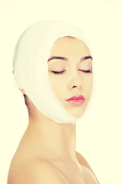 Female face with bandage — Stock Photo, Image