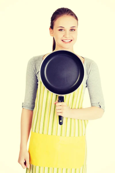 Lachende vrouw met koekenpan. — Stockfoto