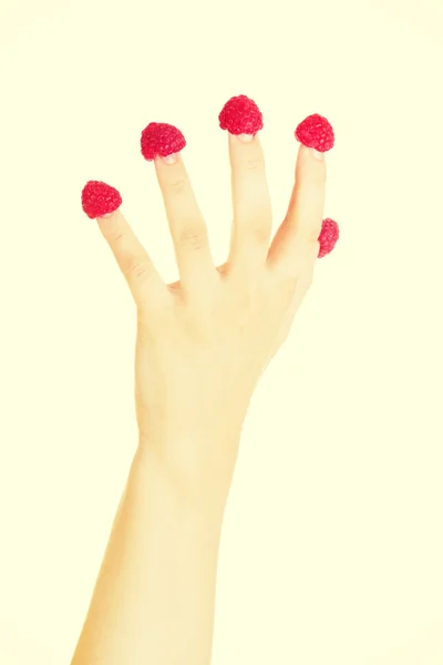 Woman hand with raspberries. — Stock Photo, Image