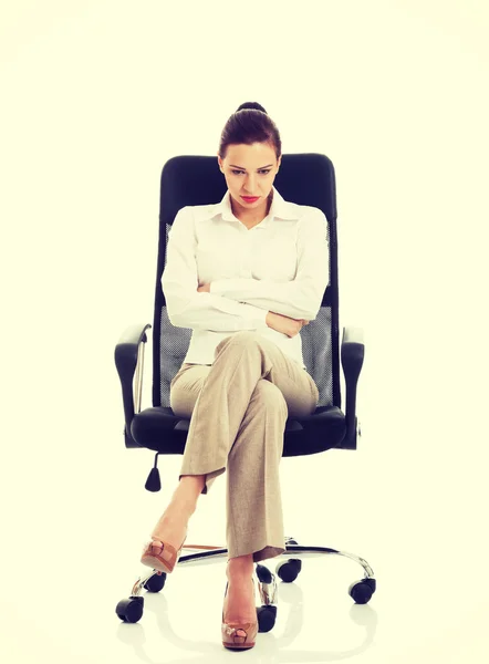 Tired woman sitting on chair. — Stock Photo, Image