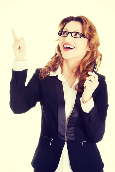 Business woman pointing up — Stock Photo, Image