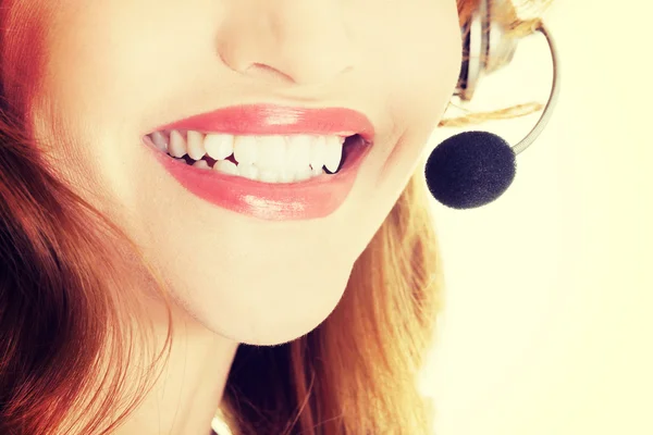 Call-center assistant smiling — Stock Photo, Image