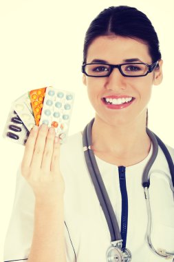 Doktor holding hapları