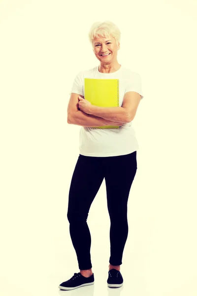 Woman with workbook — Stock Photo, Image