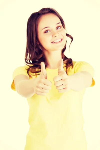 Woman gesturing thumbs up. — Stock Photo, Image