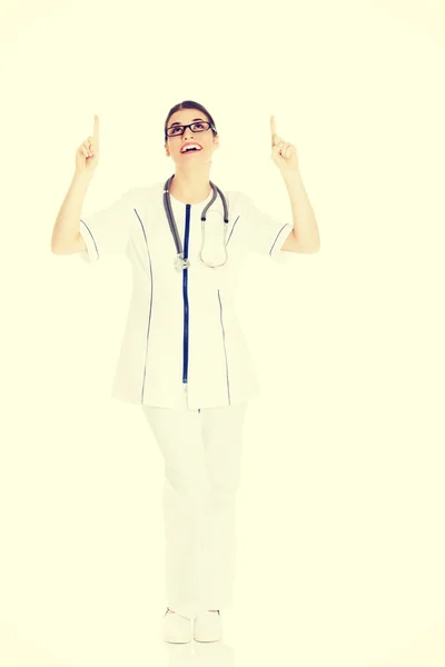Doctor apuntando hacia arriba — Foto de Stock