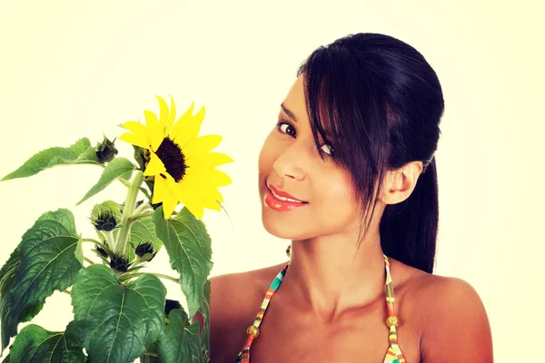 Girl with sunflower — Stock Photo, Image