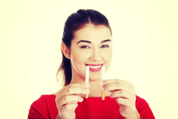 Woman with cigarettes — Stock Photo, Image