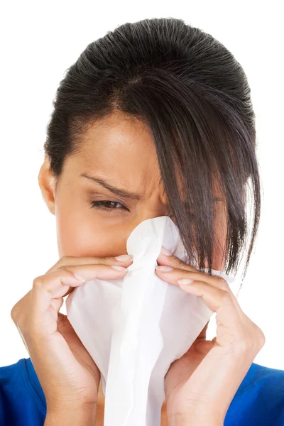 Woman with tissue. Stock Picture