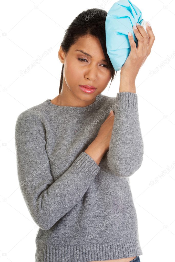 Woman having headache.