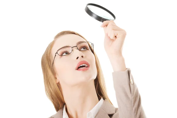 Woman with magnifying glass. — Stock Photo, Image