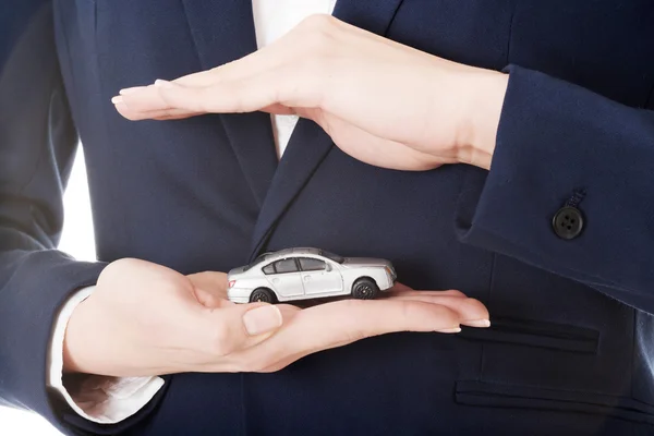 Car toy model on hands — Stock Photo, Image