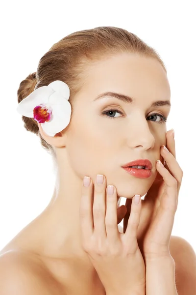 Mujer con flor de orquídea . —  Fotos de Stock