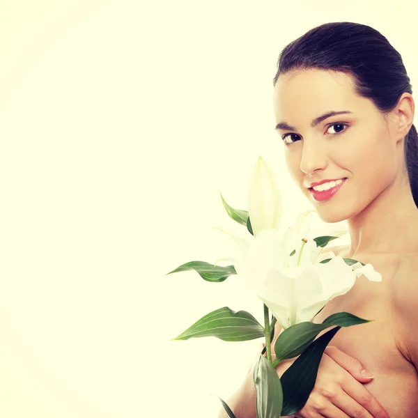 Spa woman with lily flower — Stock Photo, Image