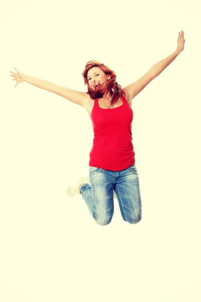 Mujer saltando en el aire — Foto de Stock