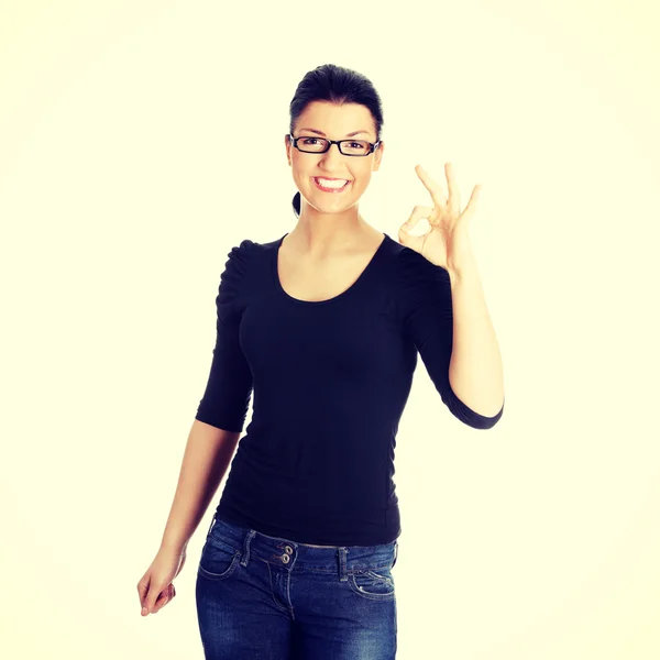 Beautiful young woman student gesturing — Stock Photo, Image