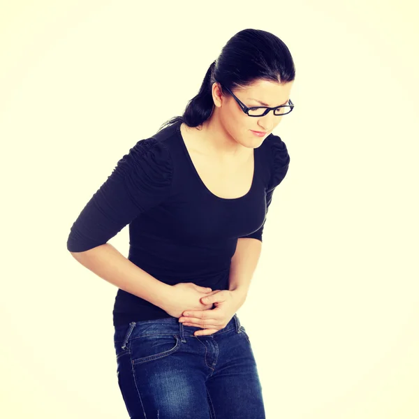 Mujer joven con problemas de estómago — Foto de Stock