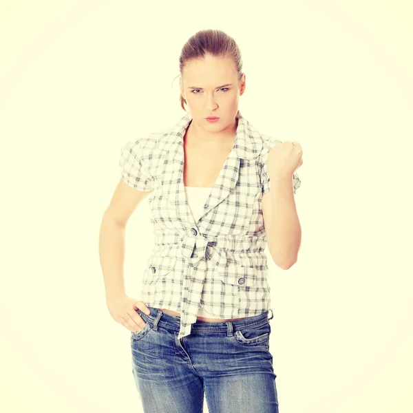 Young angry woman with fist up. — Stock Photo, Image