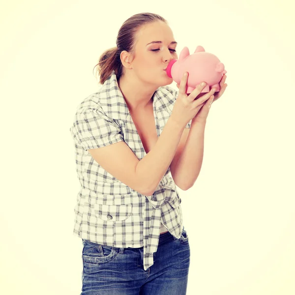 Mulher segurando Piggy Bank — Fotografia de Stock